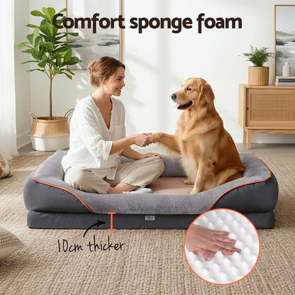 Woman sitting on a large dog bed with a golden retriever, emphasizing comfort sponge foam.